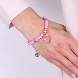 Bracciale in Metallo con campanella pendente e perline rosa